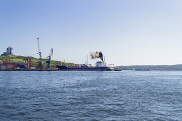 Fototapeta premium freight and cargo cranes view in Vladivostok