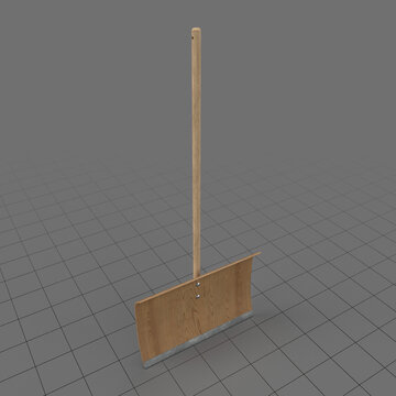 Wooden snow shovel