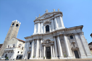 Fototapeta na wymiar Brescia is a beautiful Lombard city where the cathedral is the Cathedral of Santa Maria Assunta on Paolo VI pope square near the Broletto palace with its ancient tower.
