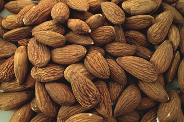 Peeled almonds closeup. For vegetarians.