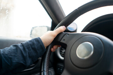 simple abstract car steering wheel, hands driving vehicle