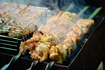 Marinated shashlik preparing on a barbecue grill