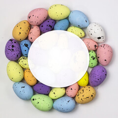 Decorated quail eggs in the shape of a circle - place for text