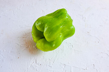 Trendy ugly organic produce  - sweet pepper on the table with copy space for text. Horizontal...