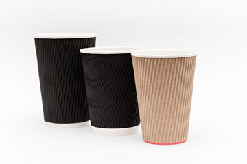 three cardboard empty cups for coffee on a white background