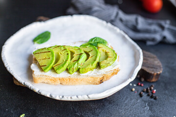 avocado fried sandwich salad vegetable grilled lettuce spinach arugula snack barbecue on the table healthy meal top view copy space text food background rustic image 