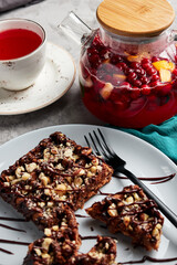 large waffles with filling on a gray background with coffee