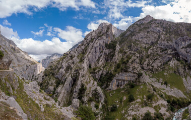 Panoramic of Cares Route in the heart of Picos de Europa National Park, Cain-Poncebos, Asturias, Spain. Narrow and impressive canyon between cliffs, bridges, caves, footpaths and rocky mountains.