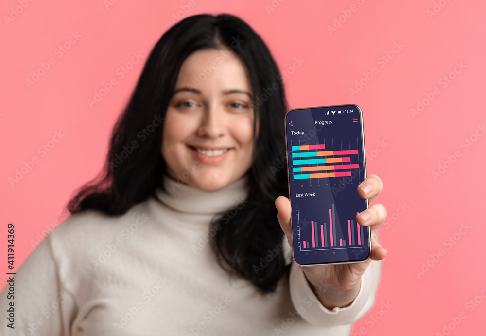 Poster Weightloss Progress App. Plus Size Woman Showing Smartphone Application For Activity Tracking