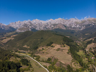 Fototapeta na wymiar Aerial view of the Picos de Europa (Peaks of Europe) a mountain range part of the Cantabrian Mountains in northern Spain.