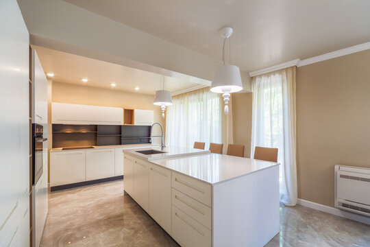 New modern white kitchen. New luxury home. Interior photography