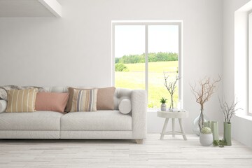 White living room with sofa and summer landscape in window. Scandinavian interior design. 3D illustration