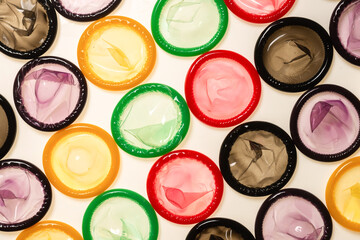 Colorful condoms background.