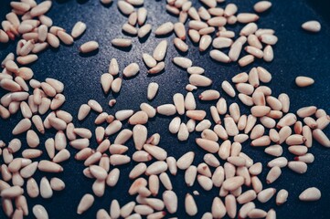 Roasted pine nuts in a pan
