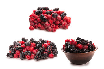 Raspberry, blackberry and mint leaf in ceramic brown bowl isolated on white