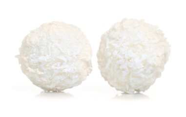 Fototapeta na wymiar Coconut coco sweets on white background isolation