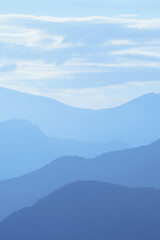 Landscape mountains in line blue sky with reflex and light and clouds