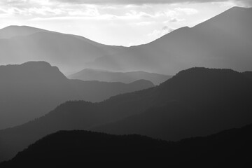 Landscape mountains in line black and white with reflex and light