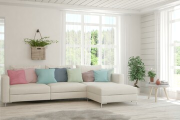 White living room with sofa and summer landscape in window. Scandinavian interior design. 3D illustration