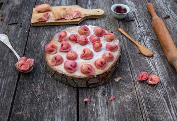 home
 tortellini made from pink beetroot dough.