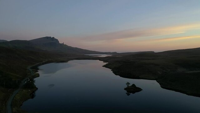 Stunning aerial flying towards Old Man of Storr at Isle of Skye in Scotland