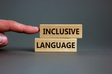 Inclusive language symbol. Wooden blocks form the words 'inclusive language' on beautiful canvas...