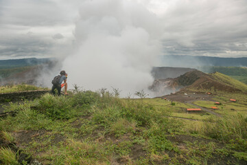 Fototapeta na wymiar active Masaya Volcano with gases and smoke coming from inside in Central Nicaragua