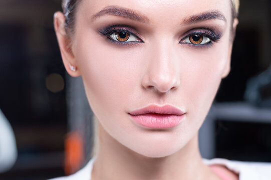 Close-up portrait of a girl. The concept of the beauty industry, cosmetology.