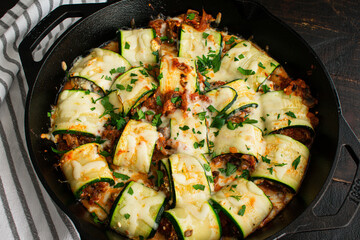 Mushroom Zucchini Lasagna Rolls in a Cast Iron Skillet: Zucchini filled with a mixture of Italian cheeses, mushrooms, and tomato sauce