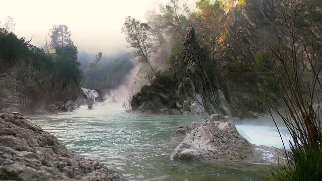 Sierra de Cazorla, Cerrada de El&iacute;as, Foggy river at sunrise at the river 