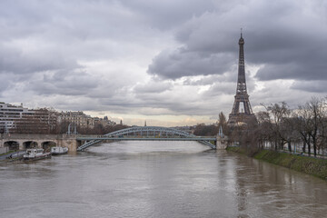 Paris, France - 02 05 2021: View of the Eiffel Tower and Swan Island from Grenelle Bridge during the Seine flood