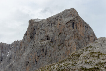 The upper start section of hiking track PR-PNP 24 to the magnificient summits of Mounts Pena Remona, Torre de Salinas, La Padierna and Pico de San Carlos at Picos de Europa National Park, Spain.