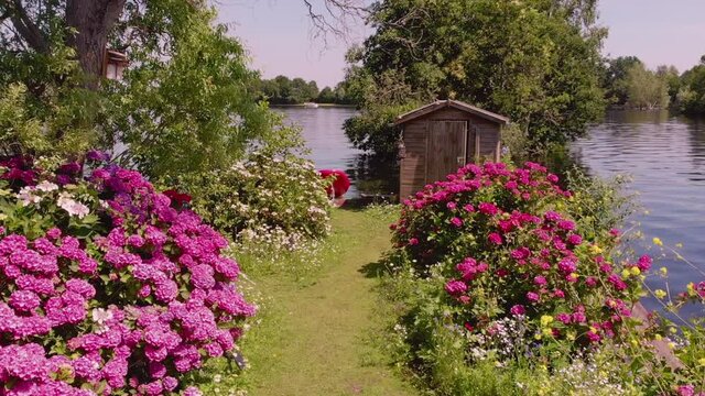 Typical landscape in the Netherlands. Artificial Dutch private islands on big blue lake. Many tourist travel here to drive a boat and enjoy the calm and quiet nature. Vinkeveen, Utrecht 11