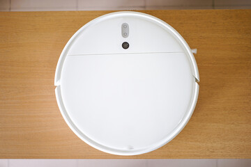 White robot vacuum cleaner mockup smart home electronics technologies automatic