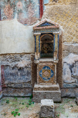 Lararium, altar or shrine of a house in Herculaneum, Italy