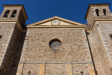 Fototapeta na wymiar The facade of Iglesia nueva de San Vicente church (New Church Of San Vicente), Potes, Picos de Europa, Cantabria, Spain.