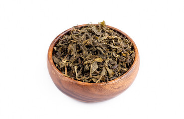Fototapeta premium Dried green tea on the white background