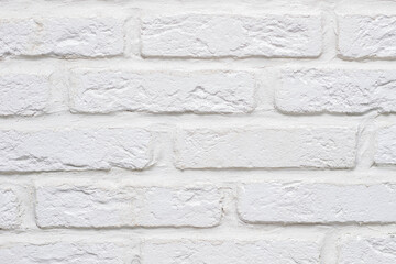 Close up of modern abstract white brick wall textured background for text or design