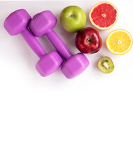 Healthy lifestyle trend Sports motivation Flat lay with female kettlebell (dumbbell) and fresh fruits