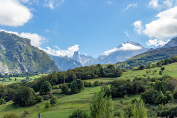 Naklejka na ściany i meble The Naranjo de Bulnes, known as Picu Urriellu, is a limestone peak dating from the paleozoic era, located in the Macizo Central region of the Picos de Europa, Asturias, Spain.