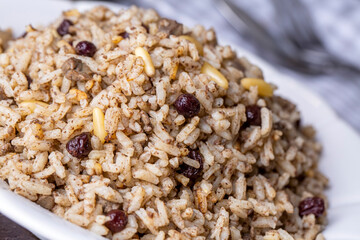 Traditional delicious Turkish food; rice pilaf with pine nuts and currants (Turkish name; ic pilav or pilaf)