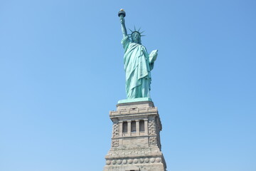 Fototapeta na wymiar Statue Of Liberty Against Clear Blue Sky
