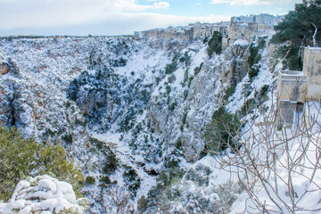 Snowy Castellaneta and canyon, Apulia, Southern Italy