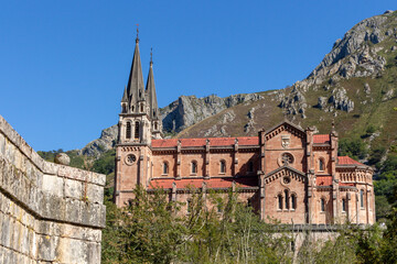 Fototapeta na wymiar Covadonga, Spain - September 4, 2020: The Basilica of Covadonga (Basilica de Santa María la Real de Covadonga) in Covadonga, Asturias, Spain.
