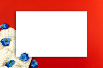 Spring mockup or template, fresh and vibrant red background with flowers, copy space and place for text