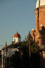 Fototapeta premium Sunset view of the historic train depot constructed 1894 in the Mission Revival style in San Juan Capistrano, California, USA.
