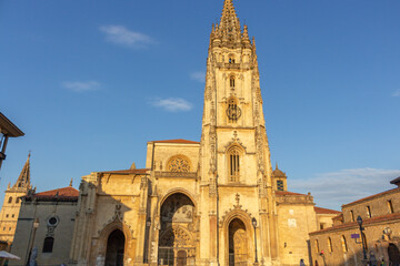 Fototapeta na wymiar Oviedo, Spain - September 4, 2020: The Metropolitan Cathedral Basilica of the Holy Saviour at sunset. Gothic cathedral located in the city of Oviedo, Asturias. It is also known as Sancta Ovetensis.