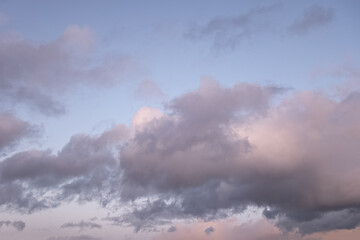 Obraz premium dramatic cloudy sunset sky blue hour background