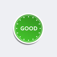 green sticker saying good, green label 