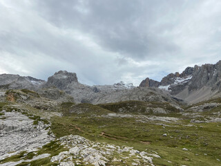 The upper start section of hiking track PR-PNP 24 to the magnificient summits of Mounts Pena Remona, Torre de Salinas, La Padierna and Pico de San Carlos at Picos de Europa National Park, Spain.